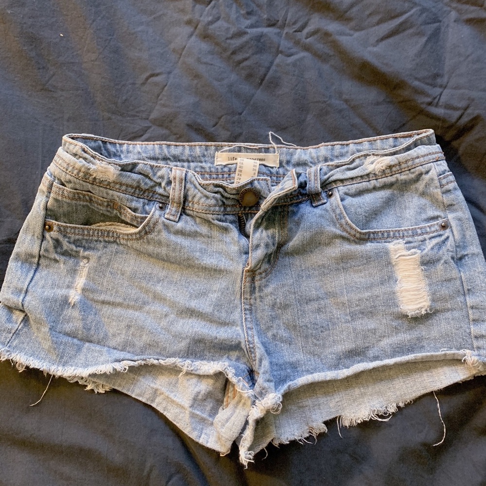 Distressed denim shorts